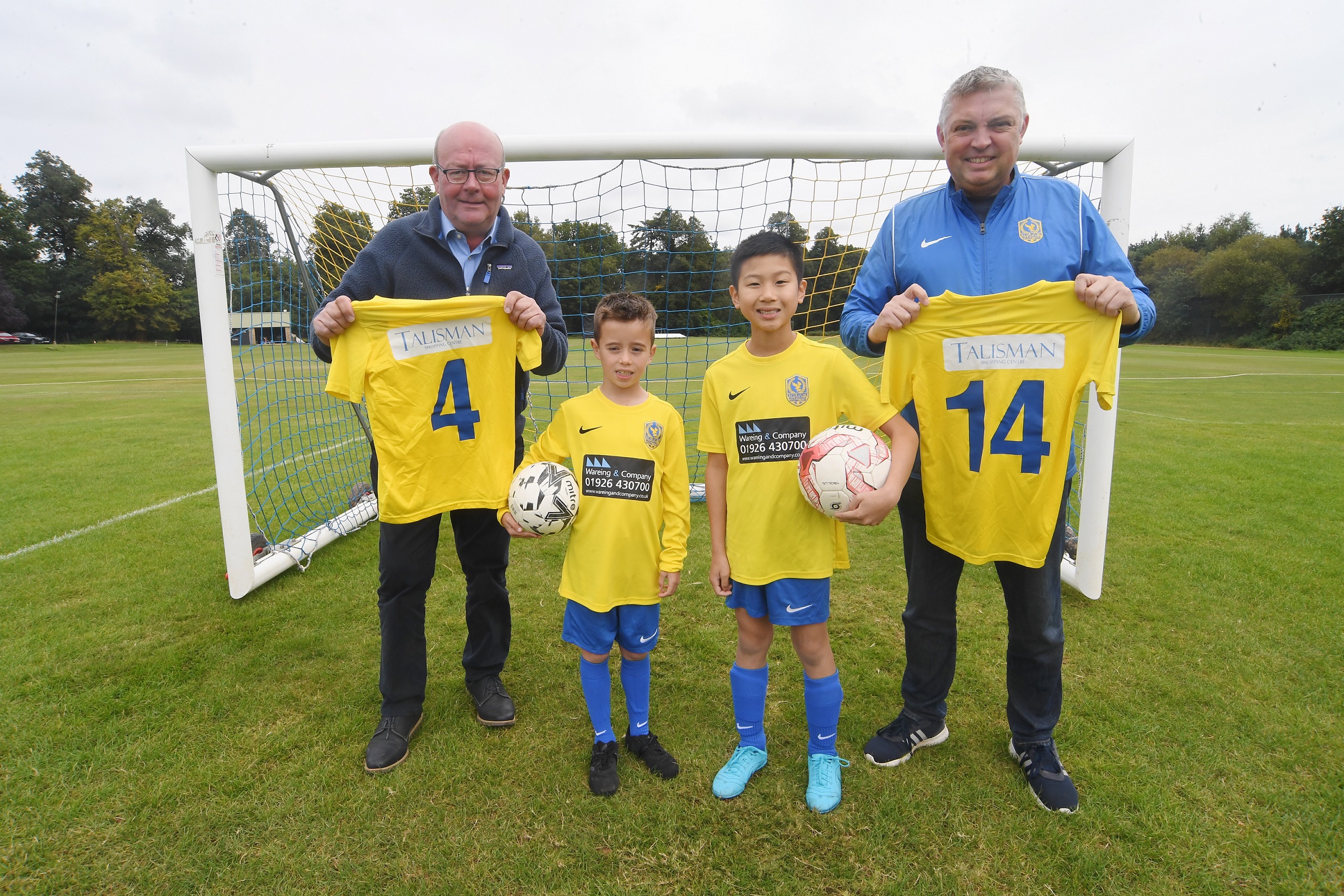 The new boys’ kit for Kenilworth Wardens Junior Football Club, sponsored by Talisman Shopping Centre and Wareing & Company. From left: Bill Wareing, Oliver Hales (7), Oscar Hua (11), Andrew Watts.